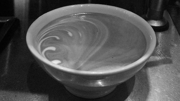 Café au lait served in a white porcelain cup
