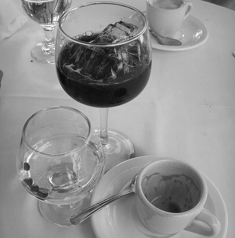 Sambuca or caffè con la mosca (anis-based liquor served with coffee beans,) an amaro (digestiv) on ice and coffee. 