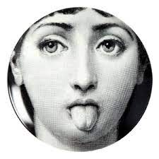 Fornasetti muse with thee tongue out