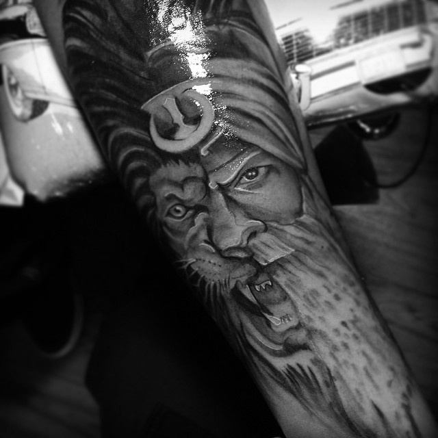 Sikh lion tattoo art. The lion symbolizes power, sovereignty, and valor. Sikh lion tattoo art. The lion symbolizes power, sovereignty, and valor.